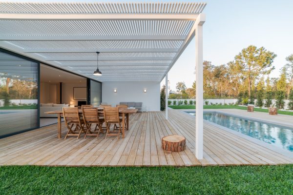 Modern villa with pool and deck with interior view